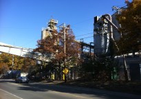 A factory building by the side of a road in Norwood MA.