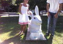The photo of the artists shows Jill and Mike standing beside their peace rabbit. Jill is short enough that most of her made the photo, but Mike's head was completely cut off in the frame.