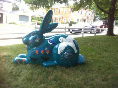 Side OtherSmaller From the other side -- this side of the rabbit is dominated by a giant white owl.