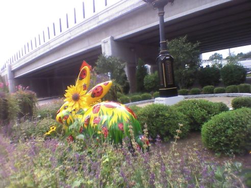 Back In this view, you can see the back of Lady Bugs, and the bridge running over her garden.
