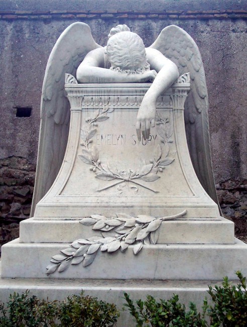 Angel of grief, a 1894 sculpture by William Wetmore Story. The sculpture serves as the gravestone of the artist and his wife Emelyn at the Protestant Cemetery, Rome. (Photo: LuciusCommons via Wikipedia)