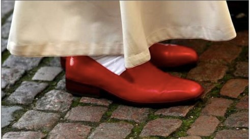 Even though I know there's a long-standing tradition of the Pope wearing red leather shoes outside, this picture always makes me think of Dorothy in the Wizard of Oz. (Photo of Pope Benedict wearing his red papal shoes via SkyNews)