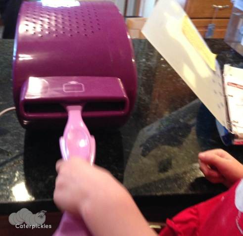 Putting the cheesy bread in. (Photo: Shala Howell)