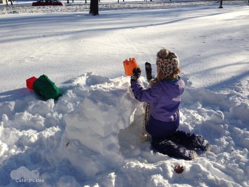 The Seven-Year-Old, building a frost dragon nest in a secret location in Chicago. Hey -- don't want y'all stealing the eggs! (Photo: Shala Howell)