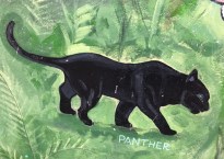 the black panther stalks over a green background