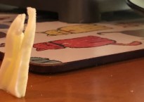 Close-up of the small slice of butter my daughter left by the toaster this morning.