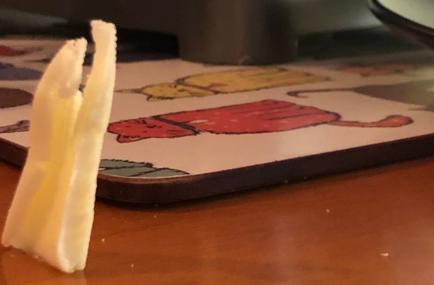 Close-up of the small slice of butter my daughter left by the toaster this morning.