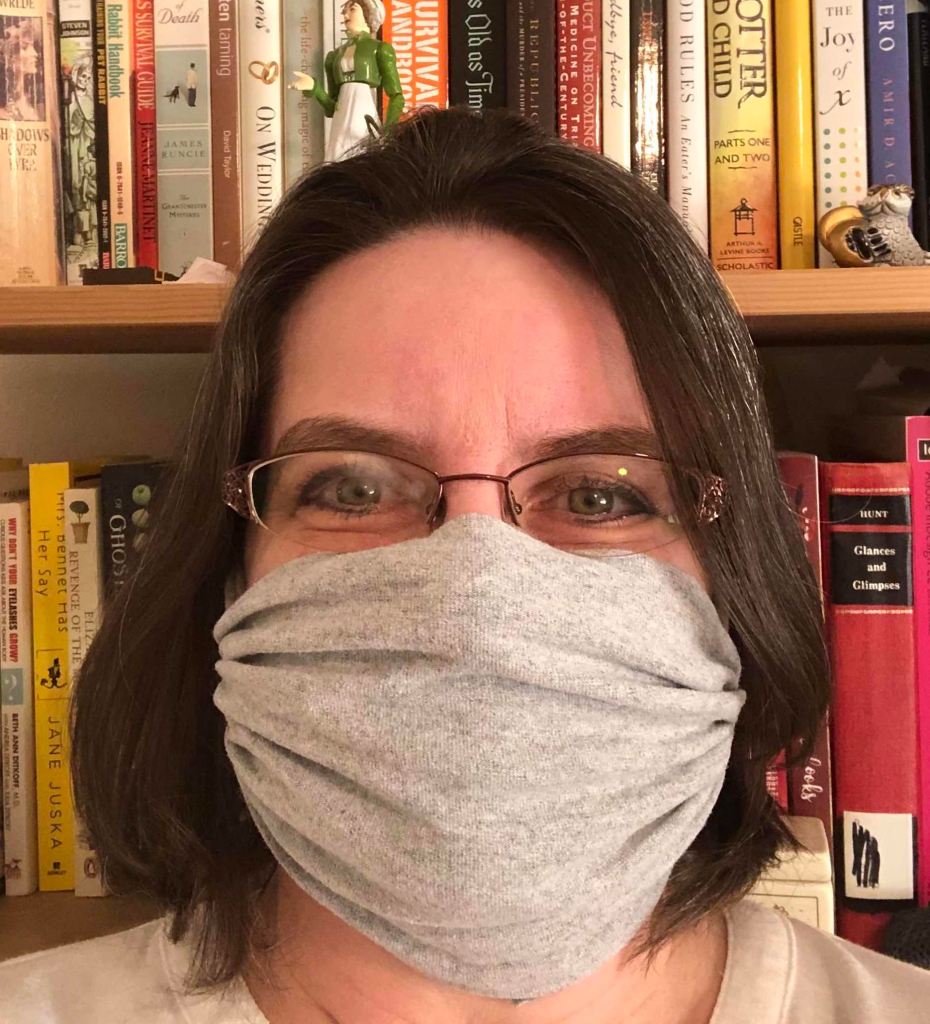 Photo of me wearing my grey t-shirt mask.