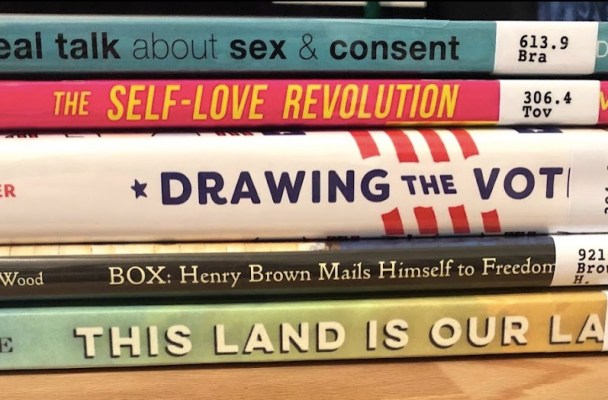 Stack of books from our nonfiction section on voting, immigration, puberty, and body positivity.